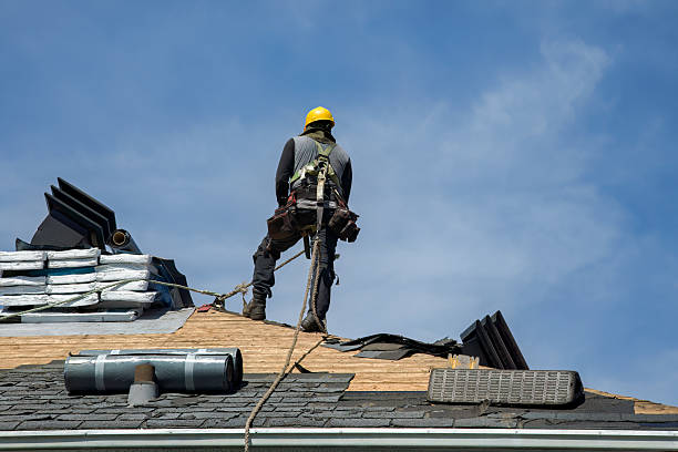 Professional Roofing technician working in Florence, OR